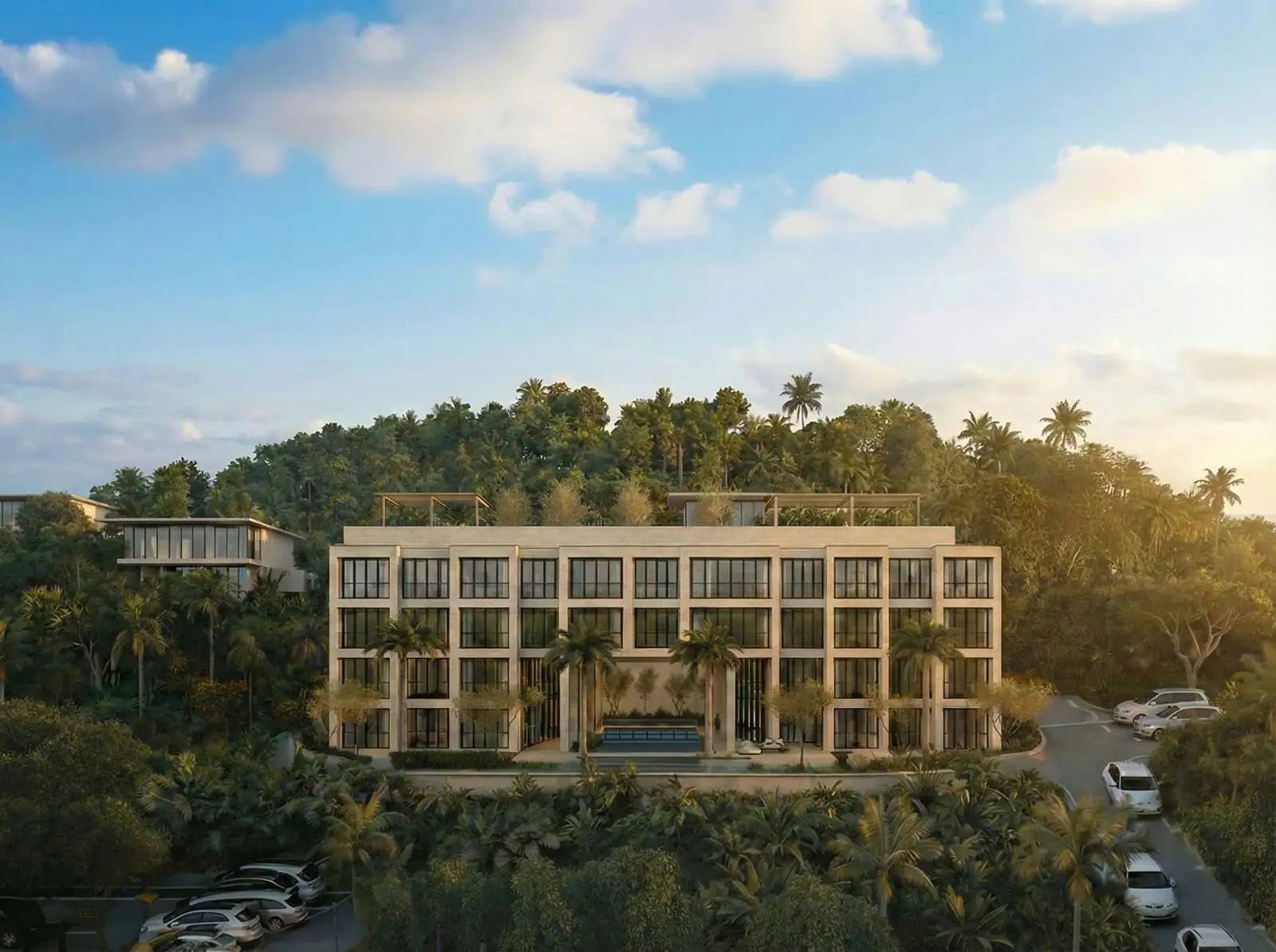 Rendering of the Kumo Living façade: a four-story stone-colored building with a central pool, surrounded by jungle